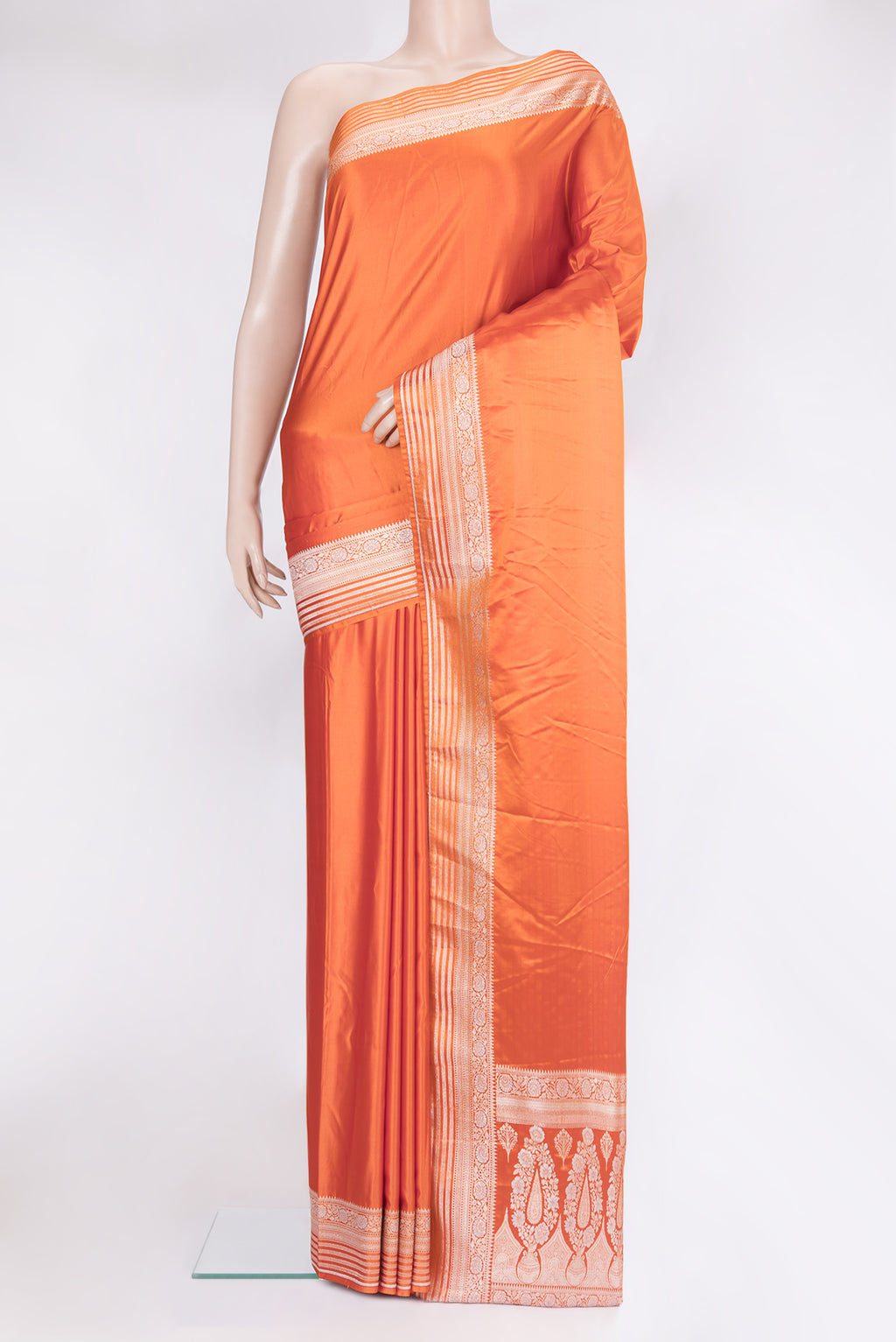 Orange Blended Banarasi Silk Saree with Plain Body and Zari Border.  displayed on a mannequin