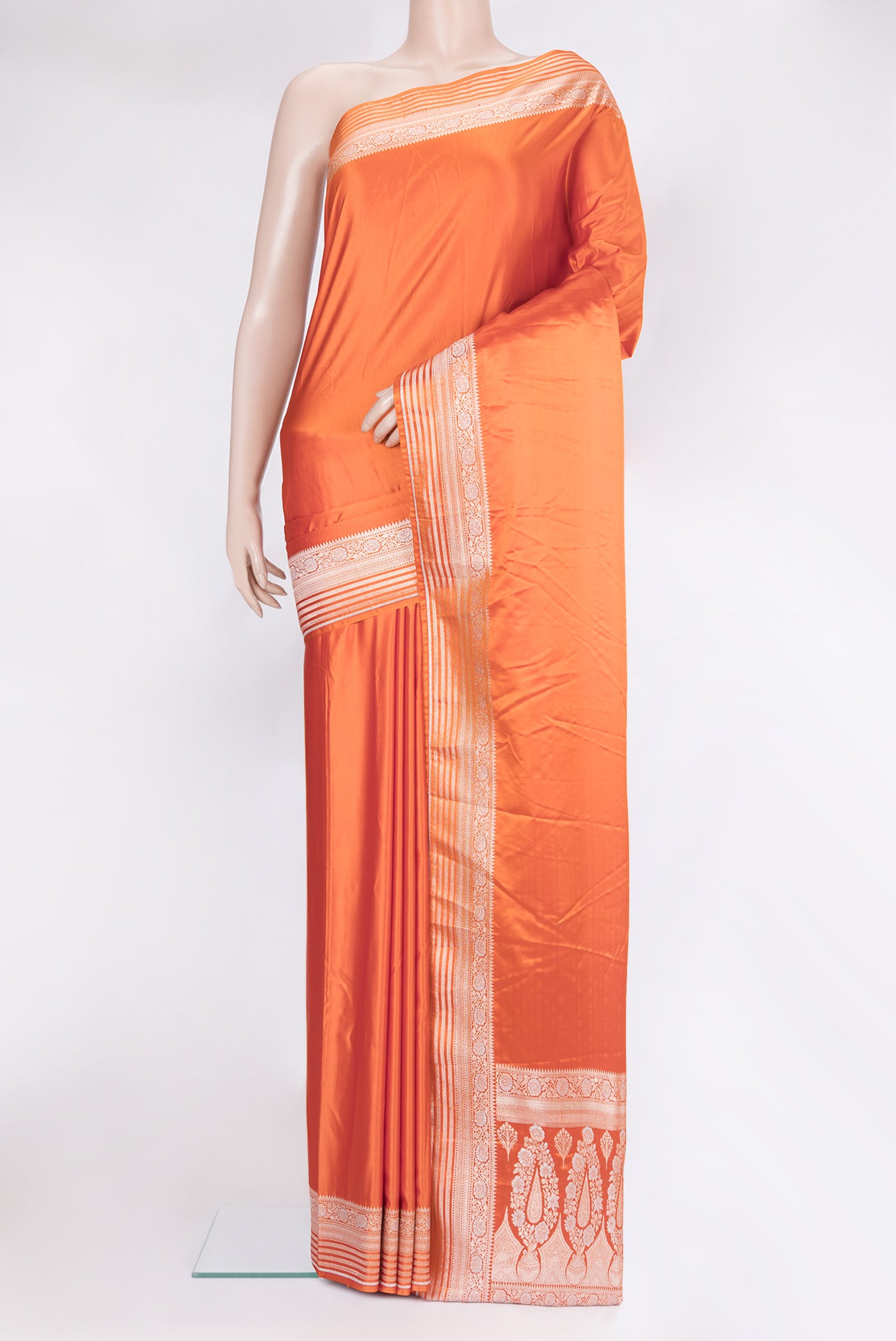 Orange Blended Banarasi Silk Saree with Plain Body and Zari Border.  displayed on a mannequin