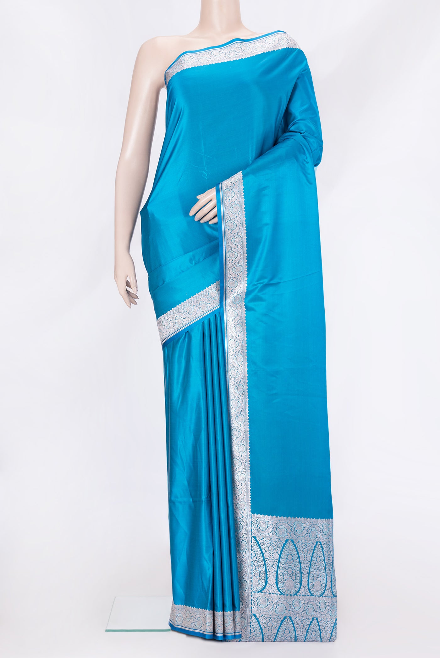 Sky Blue Dual Tone Banarasi Silk Saree with Plain Body and Zari Border.  displayed on a mannequin