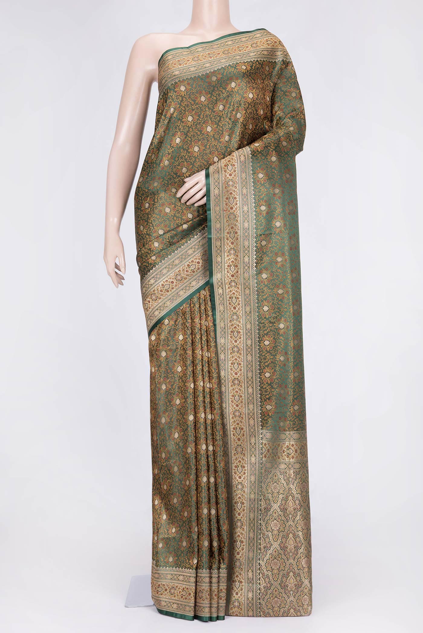 Bottle Green Dual Tone Blended Banarasi Saree with Jacquard With Zari Butta on the body and Zari Border.  displayed on a mannequin