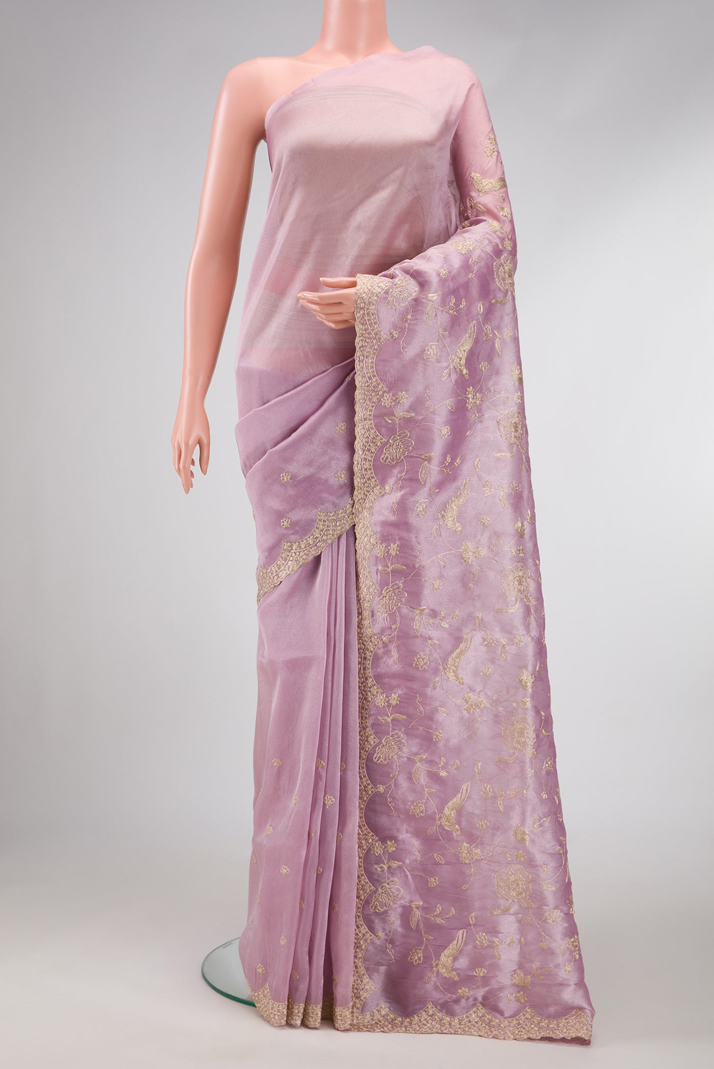 Lavender Dual Tone Blended Organza Silk Saree with Embroidery on the body and Embroidery Border.  displayed on a mannequin