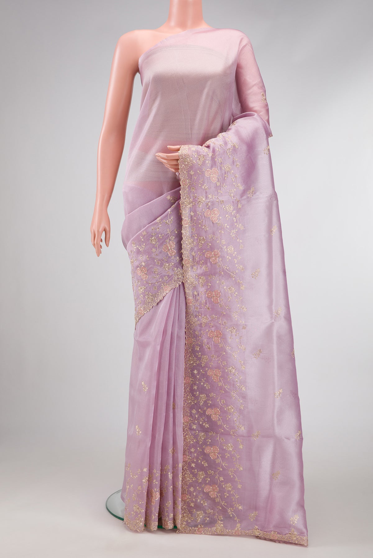 Lavender Dual Tone Blended Organza Silk Saree with Embroidery on the body and Embroidery Border.  displayed on a mannequin