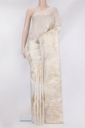 Off White Organza Silk Saree with Zari Brocade on the body and Sequin Border.  displayed on a mannequin