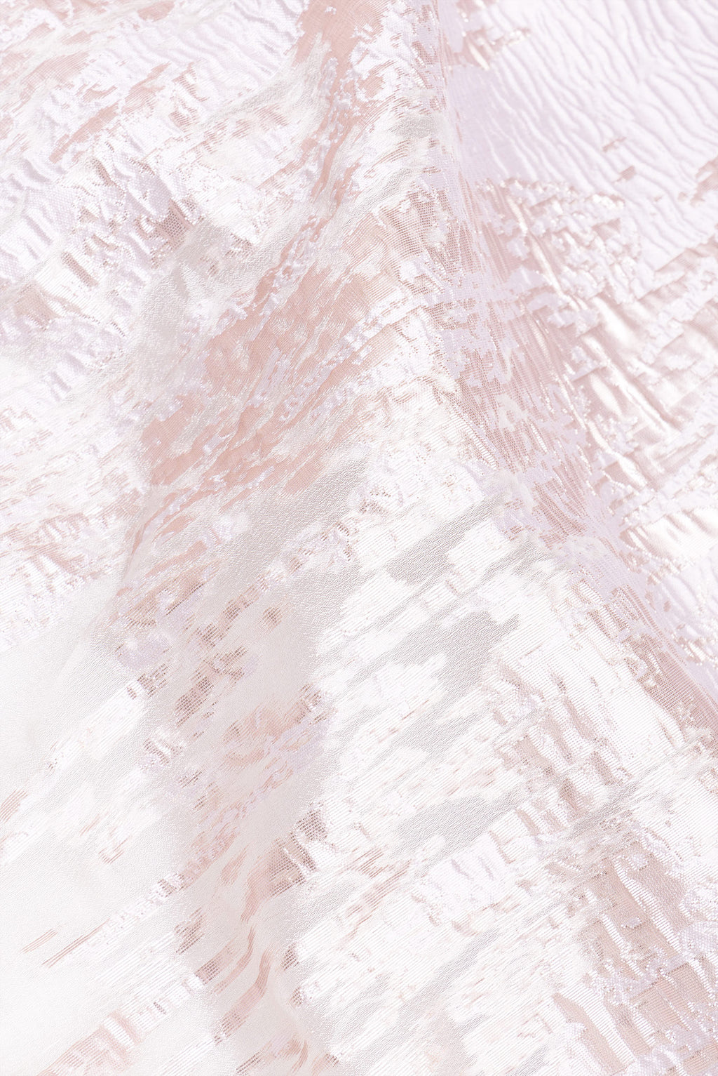 Close up of Off White Organza Silk Saree with Zari Brocade on the body and Sequin Border.  displaying folds