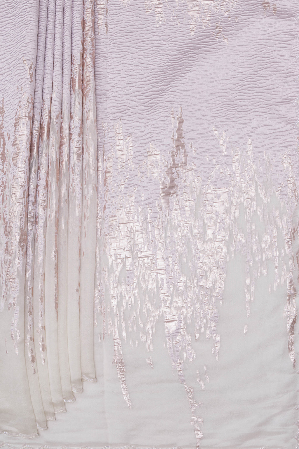 Pleats and pallu of Off White Organza Silk Saree with Zari Brocade on the body and Sequin Border. 