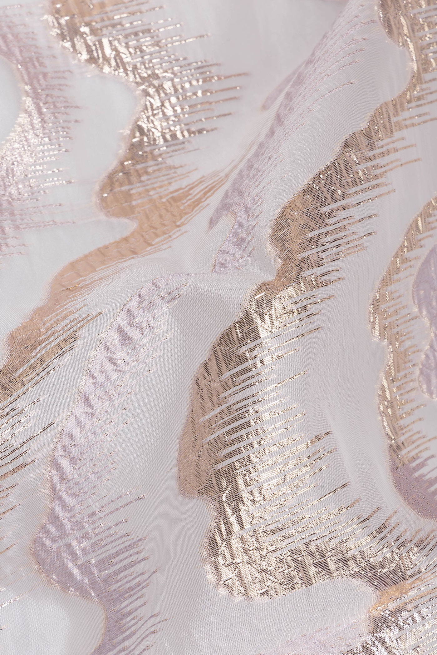 Close up of Pure Silk Lavender Organza Saree with Embroidery on the body and Embroidery Border.  displaying folds