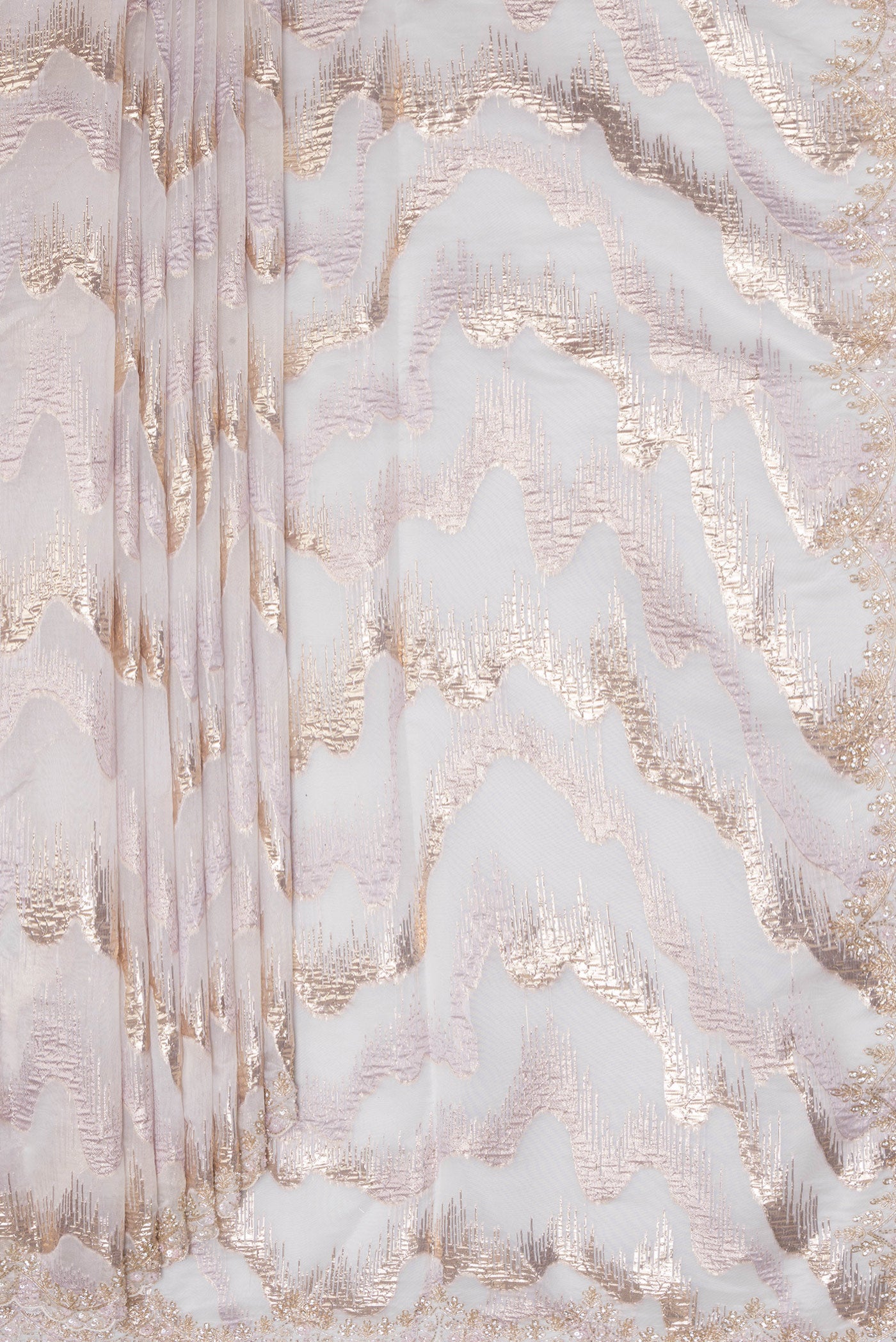 Pleats and pallu of Pure Silk Lavender Organza Saree with Embroidery on the body and Embroidery Border. 