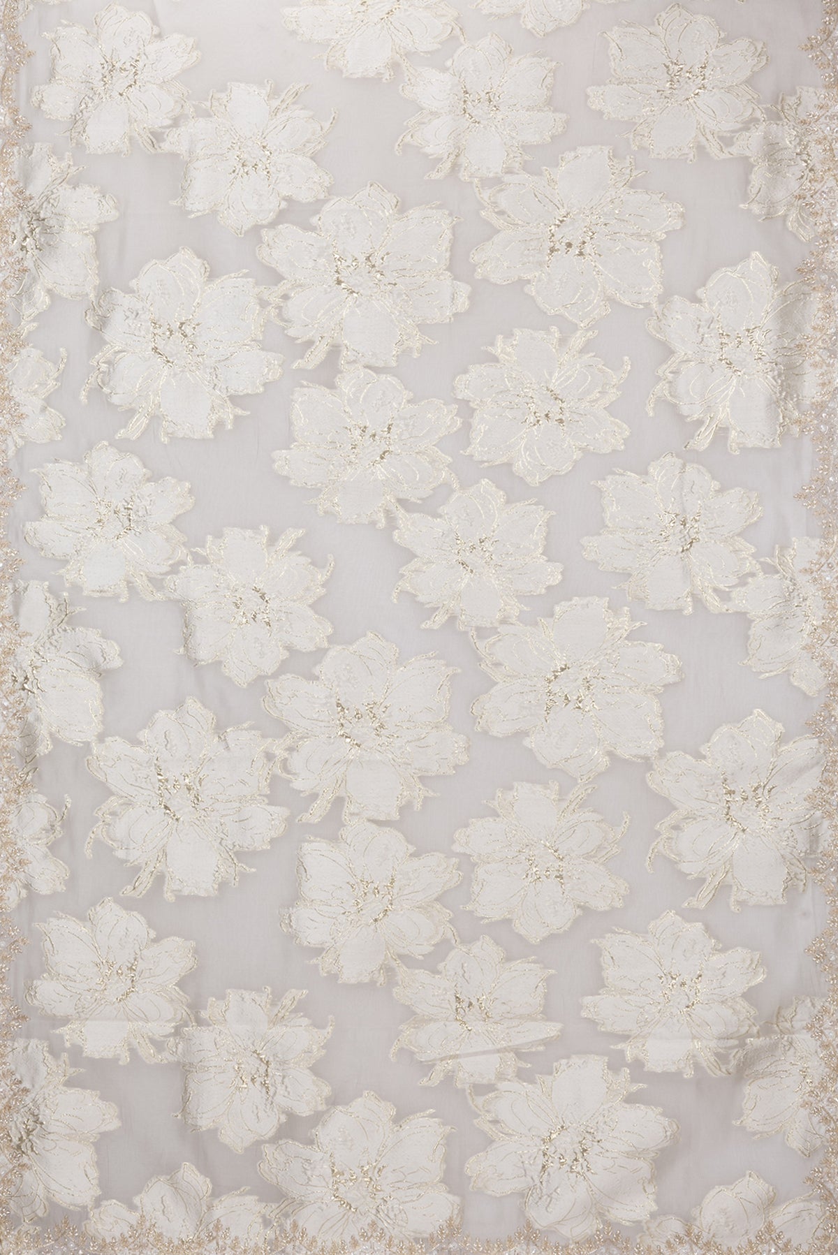Flat view of Off White Organza Silk Saree with Zari Brocade on the body and Embroidery Border. 