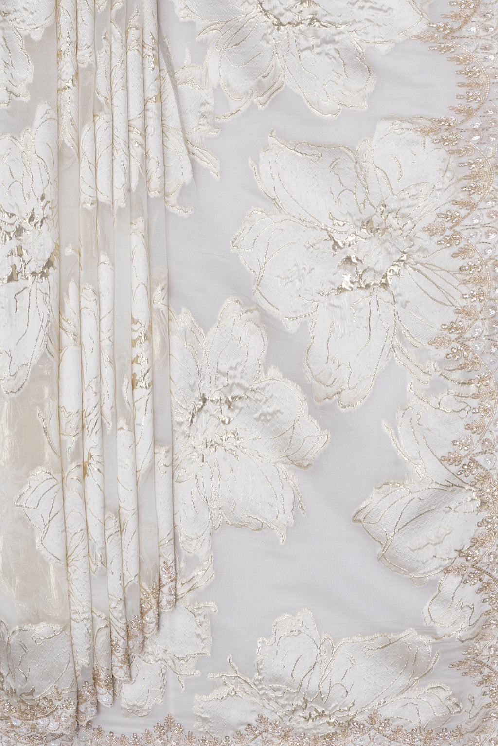 Pleats and pallu of Off White Organza Silk Saree with Zari Brocade on the body and Embroidery Border. 