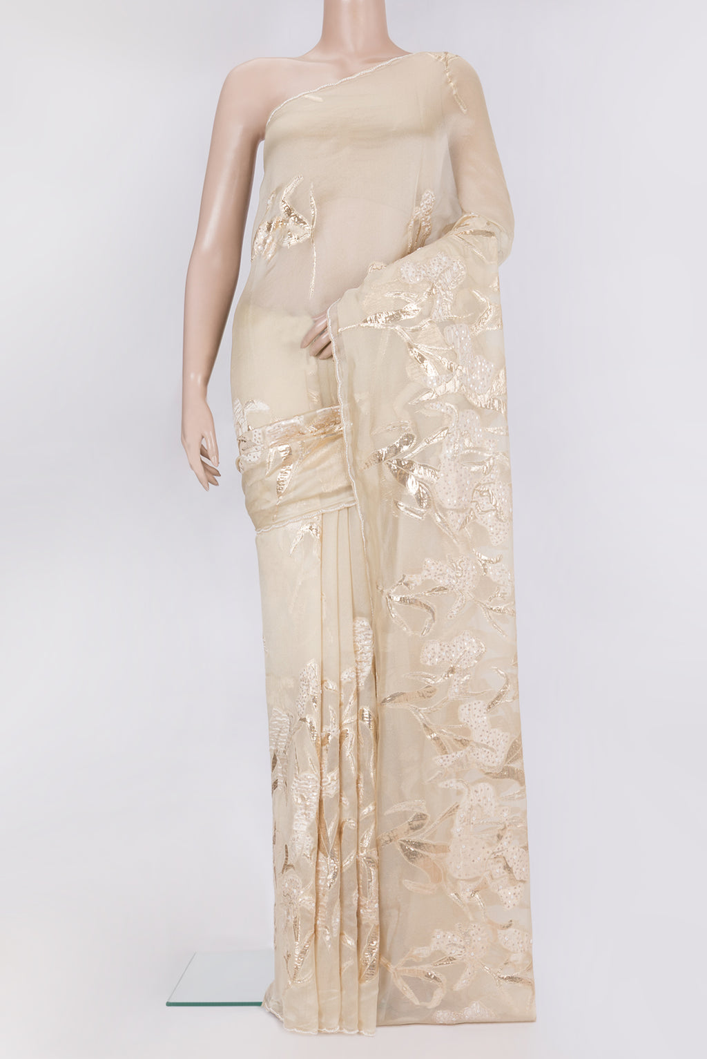 Pure Silk Beige Organza Saree with Embroidery on the body and Embroidery Border.  displayed on a mannequin