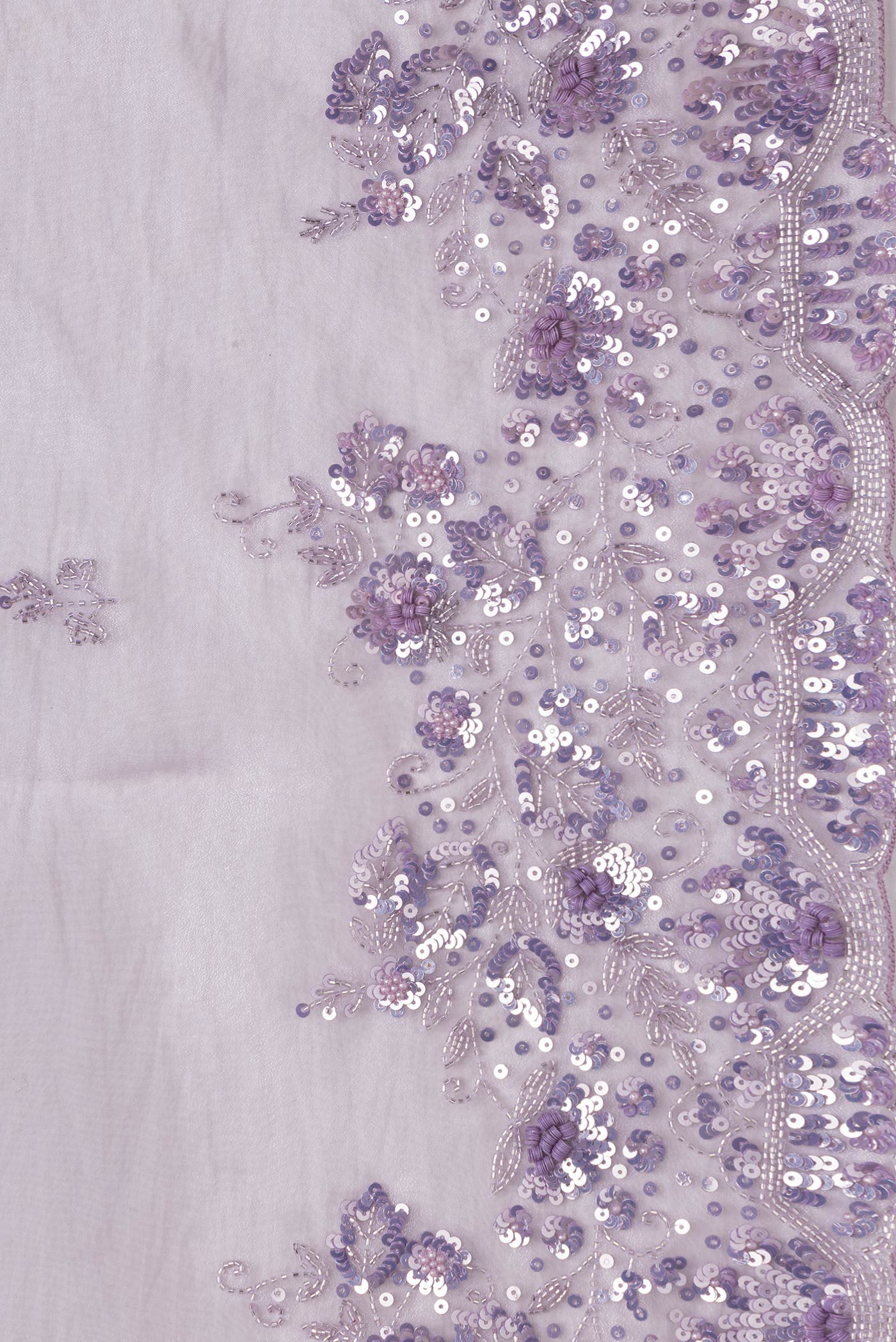 Border image of Lavender Dual Tone Organza Silk Saree with Embroidery on the body and Embroidery Border. 