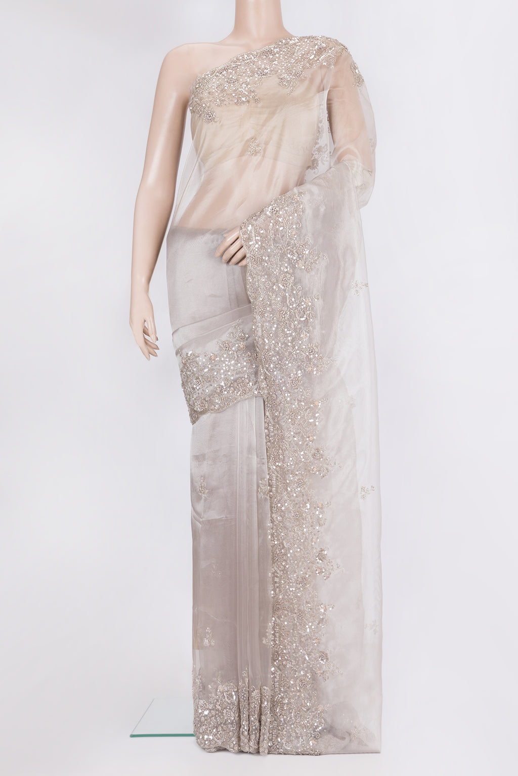 Lilac Dual Tone Organza Saree with Embroidery on the body and Embroidery Border.  displayed on a mannequin