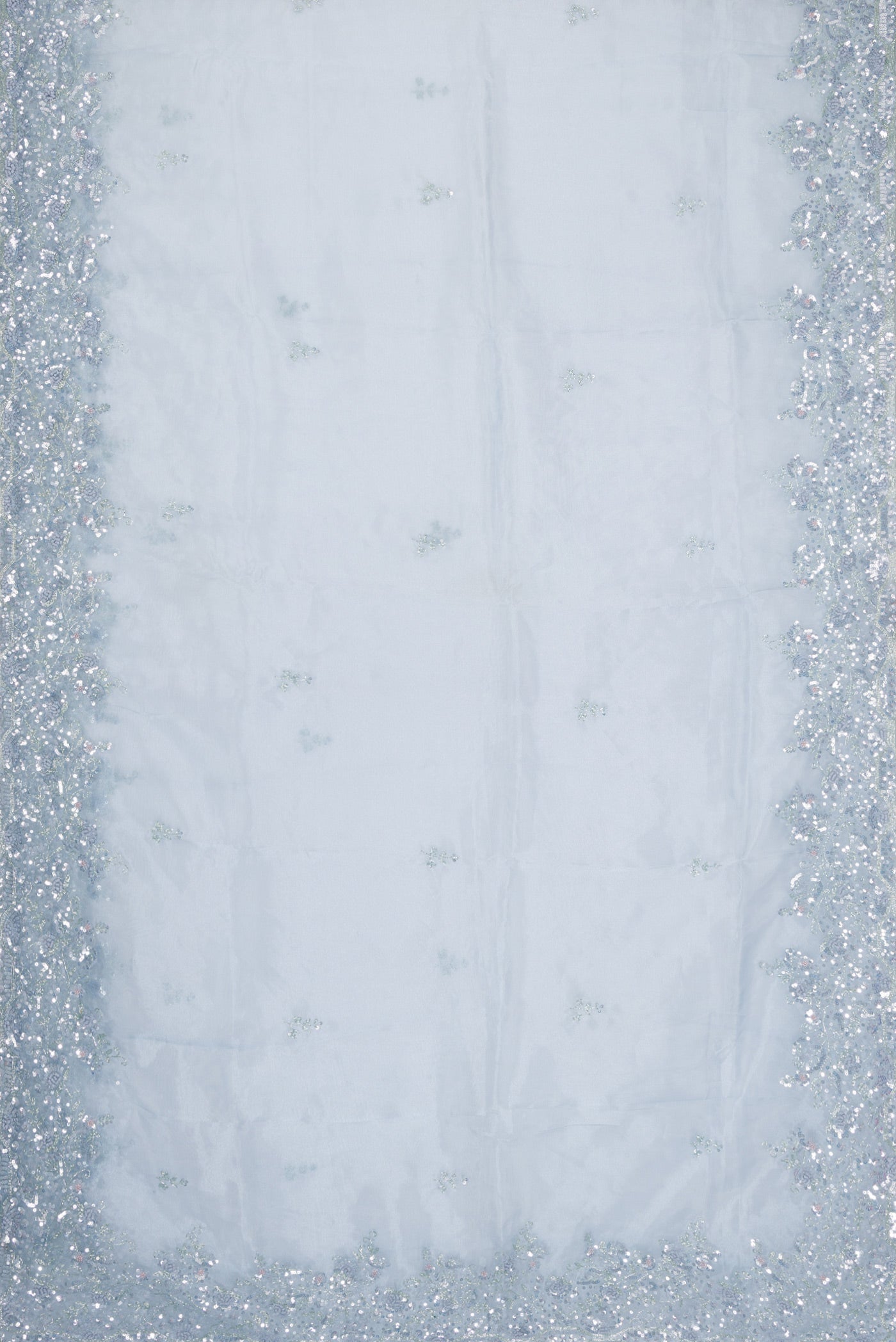Flat view of Light Blue Dual Tone Organza Silk Saree with Embroidery on the body and Embroidery Border. 