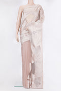 Rose Gold Organza Silk Saree with Zari Brocade on the body and Embroidery Border.  displayed on a mannequin