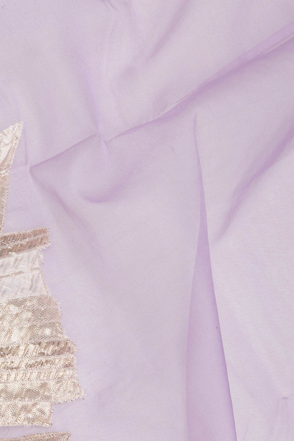 Close up of Lavender Organza Silk Saree with Zari Brocade on the body and Embroidery Border.  displaying folds