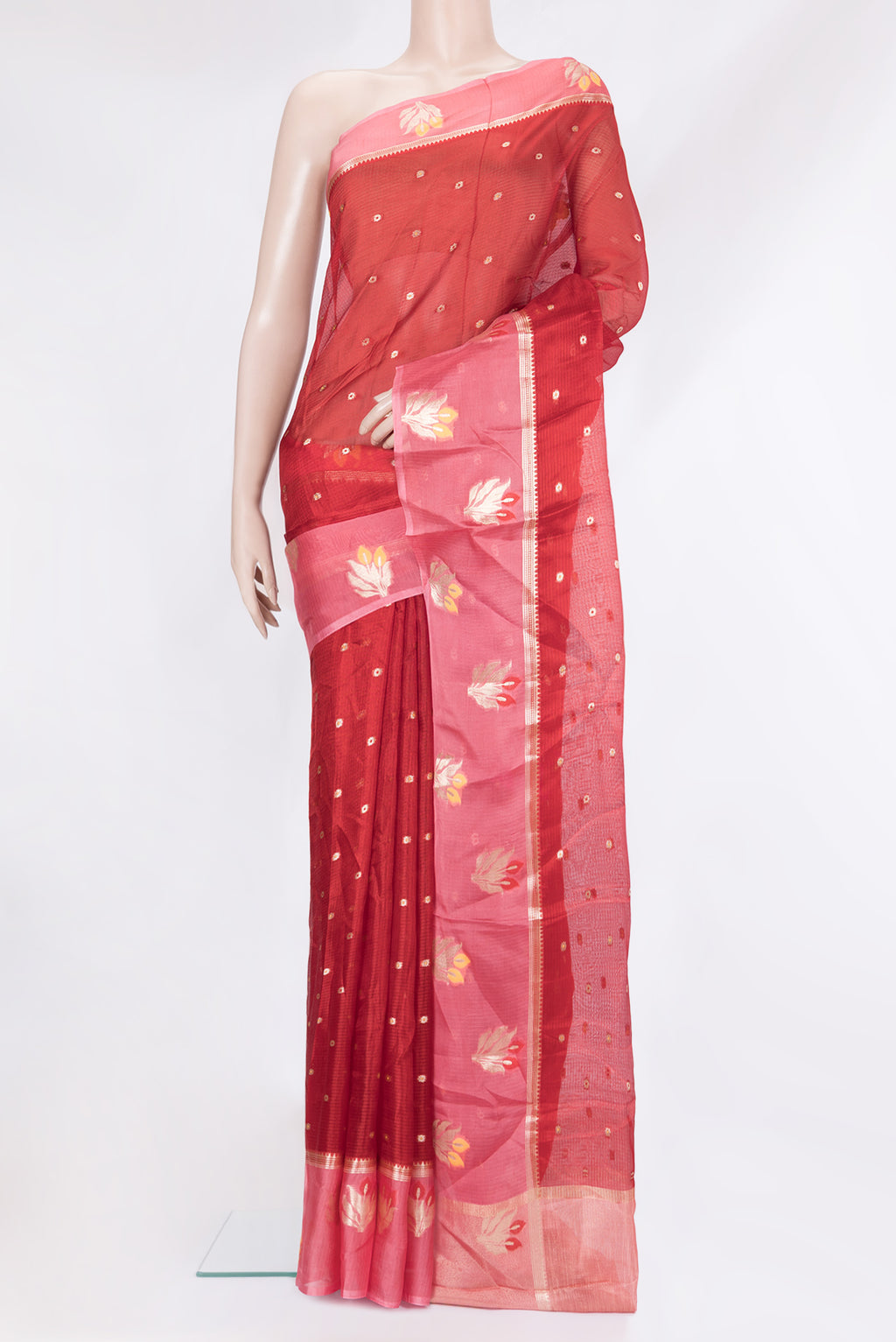 Red Kota Silk Saree with Zari Butta on the body and Fancy Border.  displayed on a mannequin