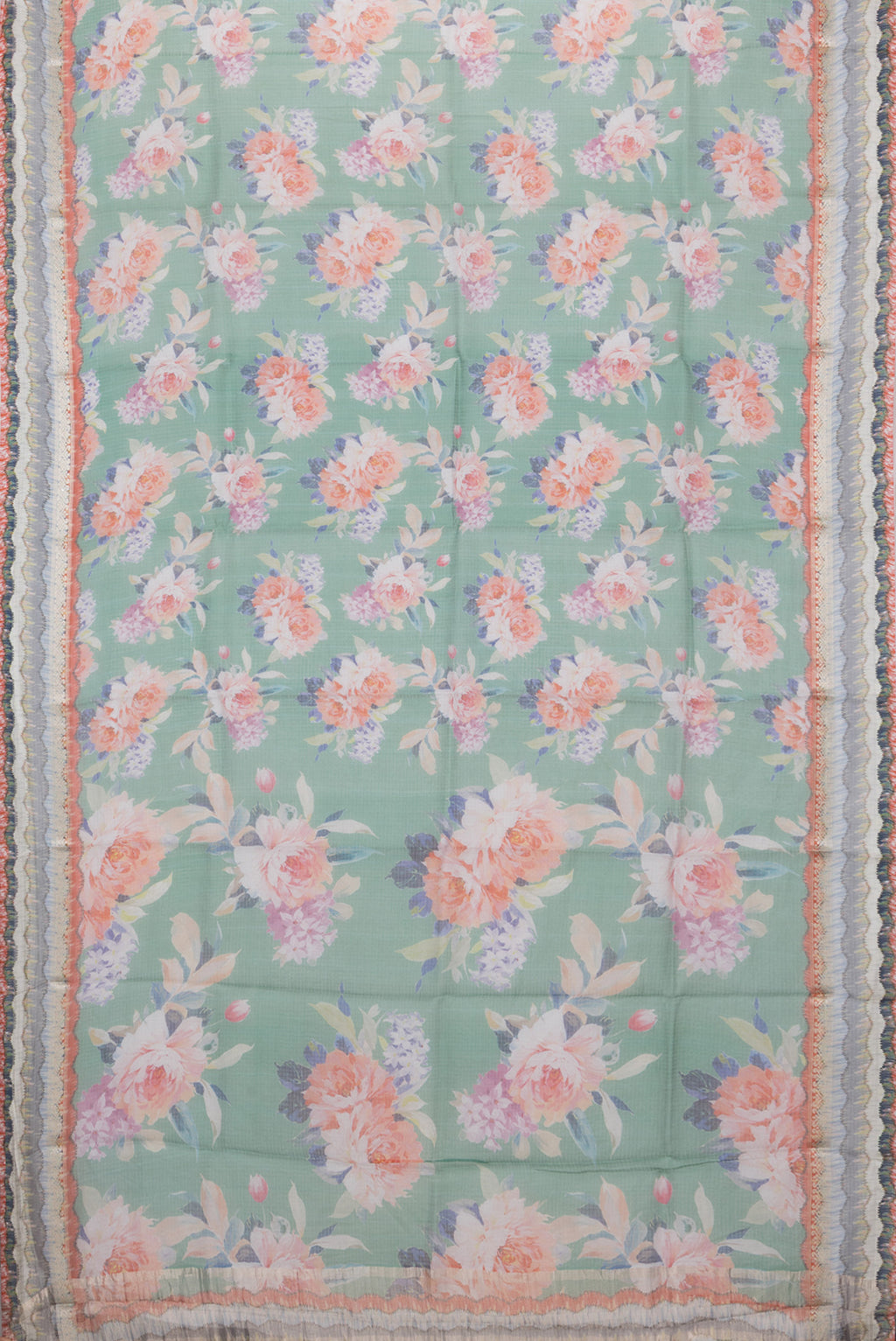 Flat view of Green Kota Silk Saree with Printed design on the body and Fancy Border. 
