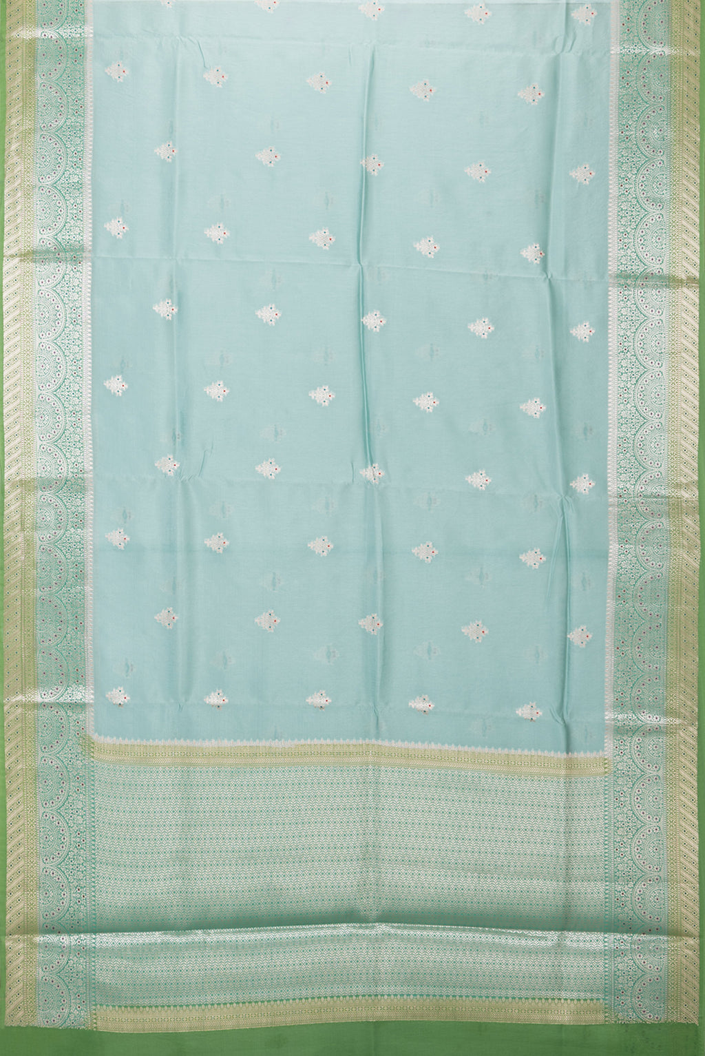 Flat view of Light Blue Blended Tussar Silk Saree with Zari Butta on the body and Fancy Border. 