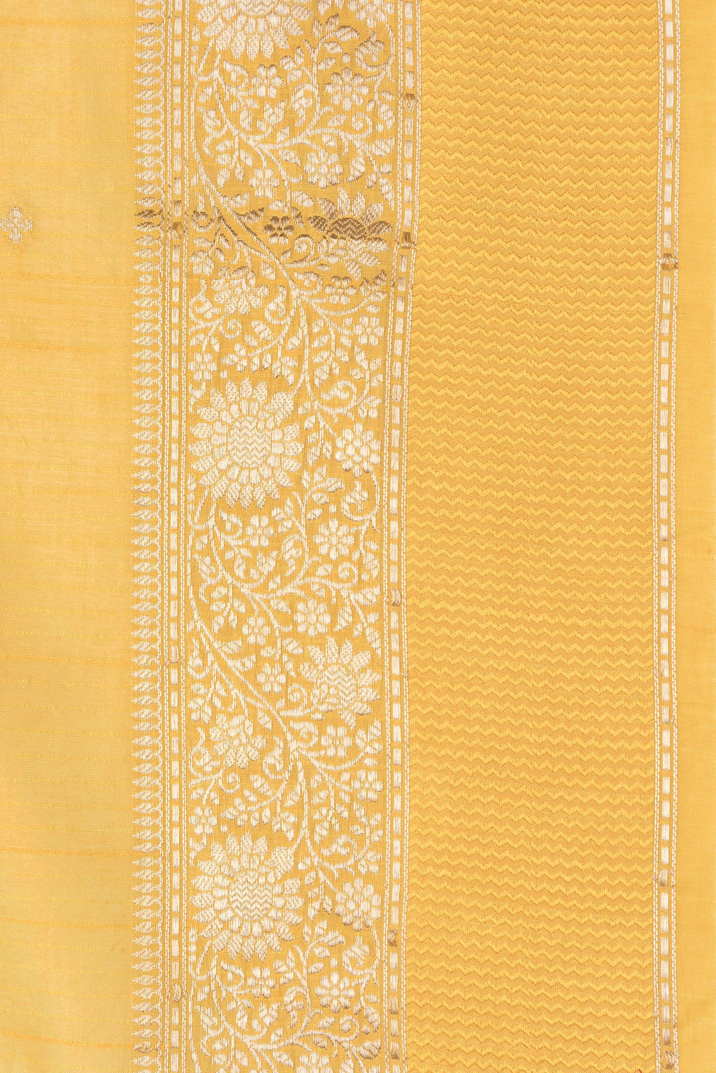 Border image of Mustard Dual Tone Tussar Silk Saree with Zari Butta on the body and Zari And Thread Border. 