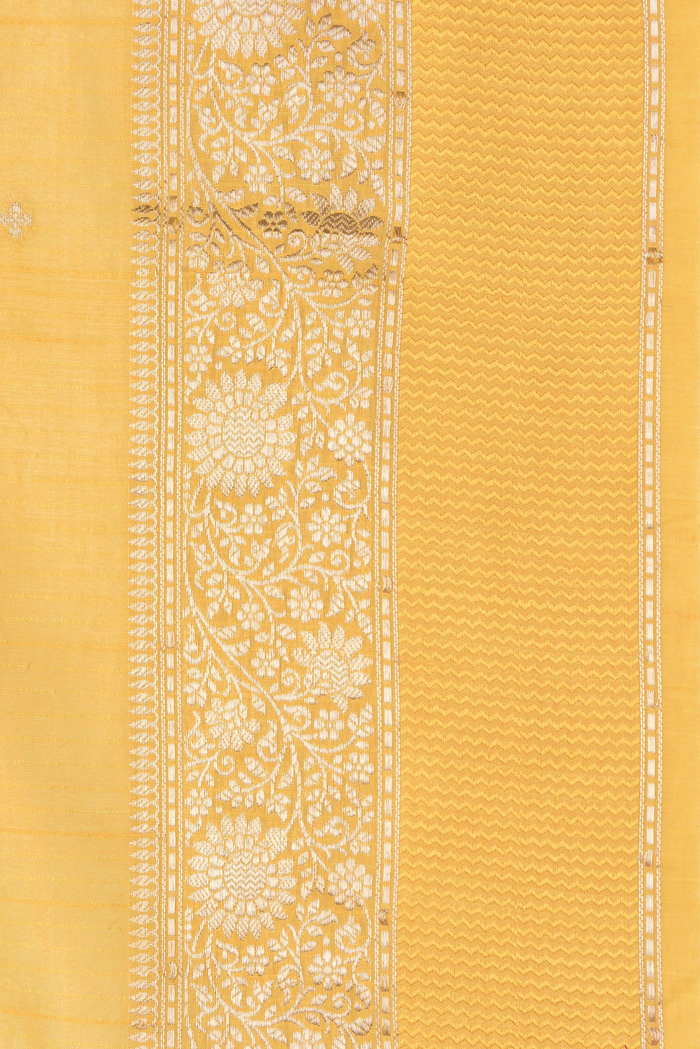 Border image of Mustard Dual Tone Tussar Silk Saree with Zari Butta on the body and Zari And Thread Border. 
