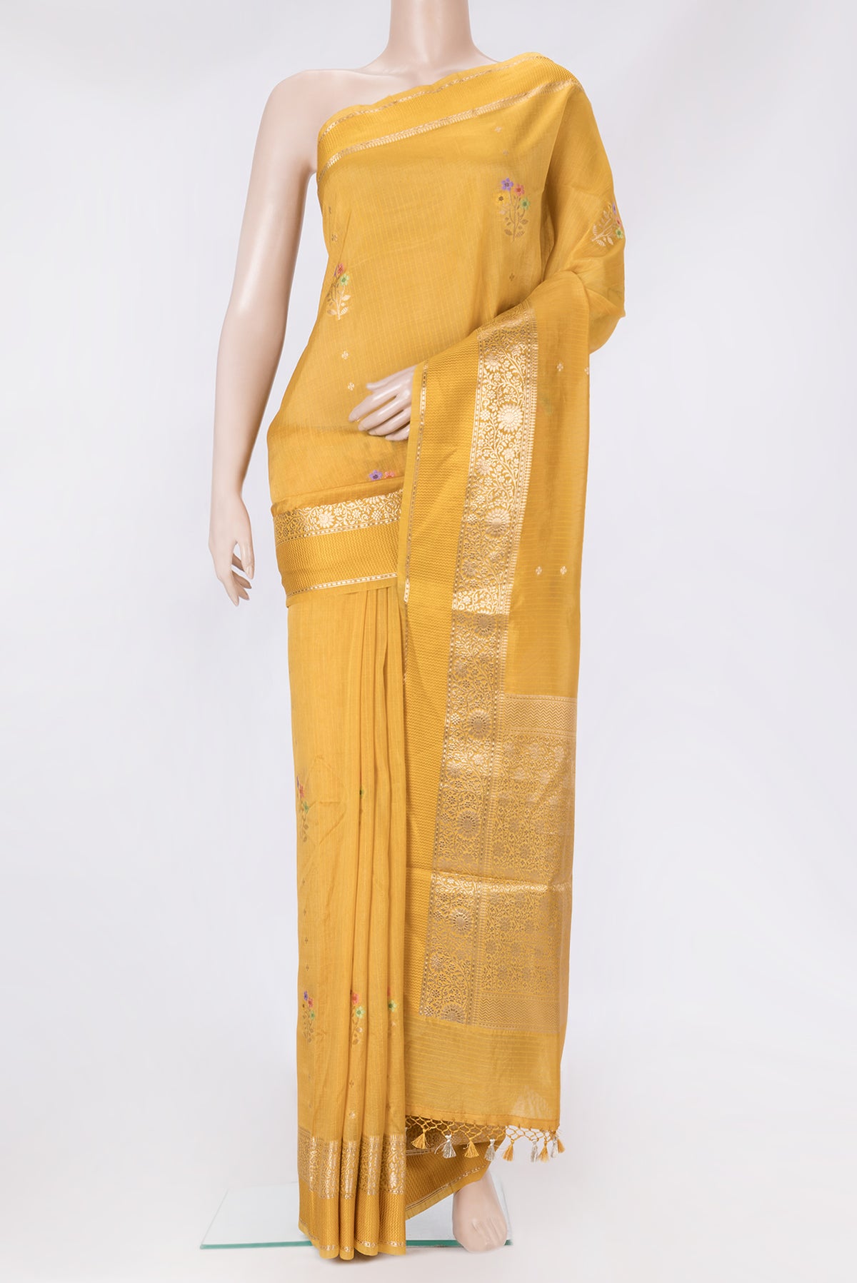 Mustard Dual Tone Tussar Silk Saree with Zari Butta on the body and Zari And Thread Border.  displayed on a mannequin