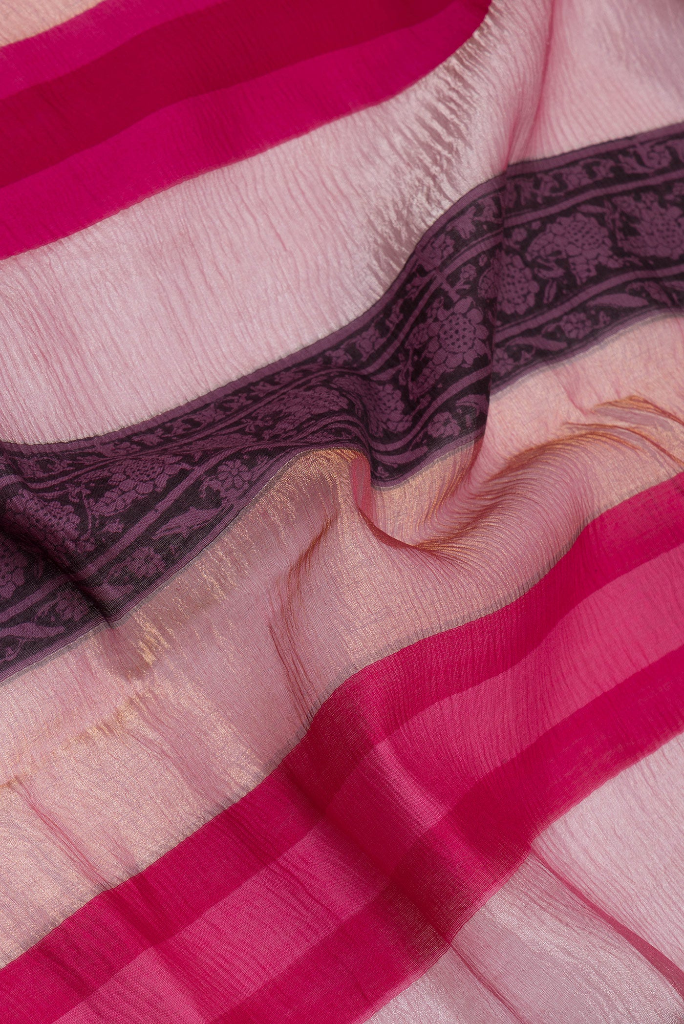 Close up of Multi Color Tussar Silk Saree with Stripes on the body and Zari Border.  displaying folds