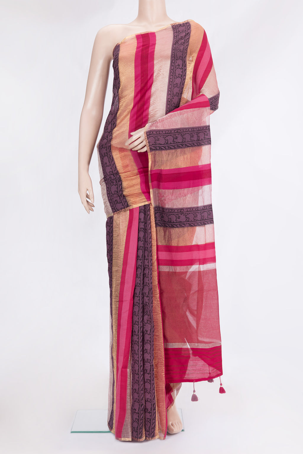 Multi Color Tussar Silk Saree with Stripes on the body and Zari Border.  displayed on a mannequin