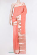 Peach Tussar Silk Saree with Plain Body and Fancy Border.  displayed on a mannequin