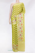 Parrot Green Banarasi Georgette Saree with Zig Zag design on the body and Zari Border.  displayed on a mannequin