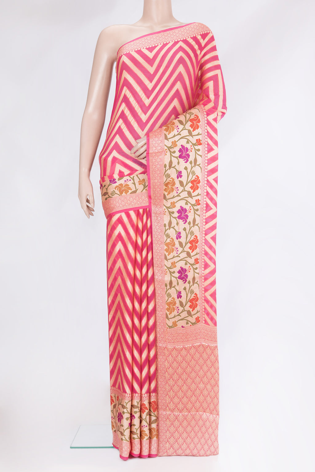 Pink Banarasi Georgette Saree with Zig Zag design on the body and Fancy Border.  displayed on a mannequin