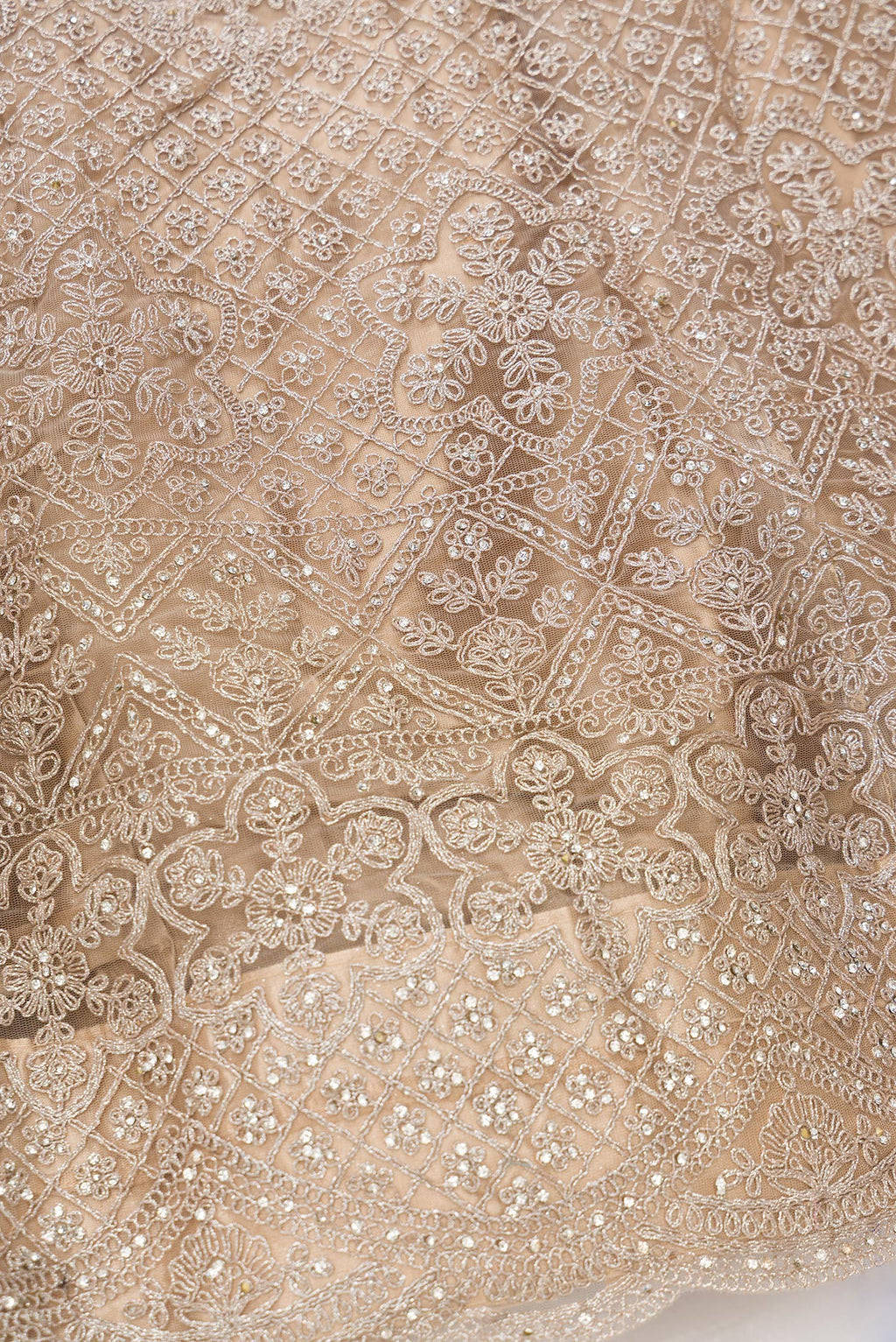 Detailed shot of Caramel Raw Silk Womens Lehenga set featuring Embroidered Choli paired with Caramel Embroidered Skirt with Embroidered Border and a Embroidered dupatta in Caramel