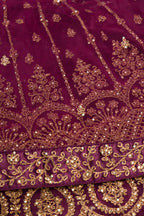 Close up blouse image of Burgundy Banarasi Silk Womens Lehenga set featuring Embroidered Choli paired with Burgundy Embroidered Skirt with Embroidered Border and a Embroidered dupatta in Burgundy