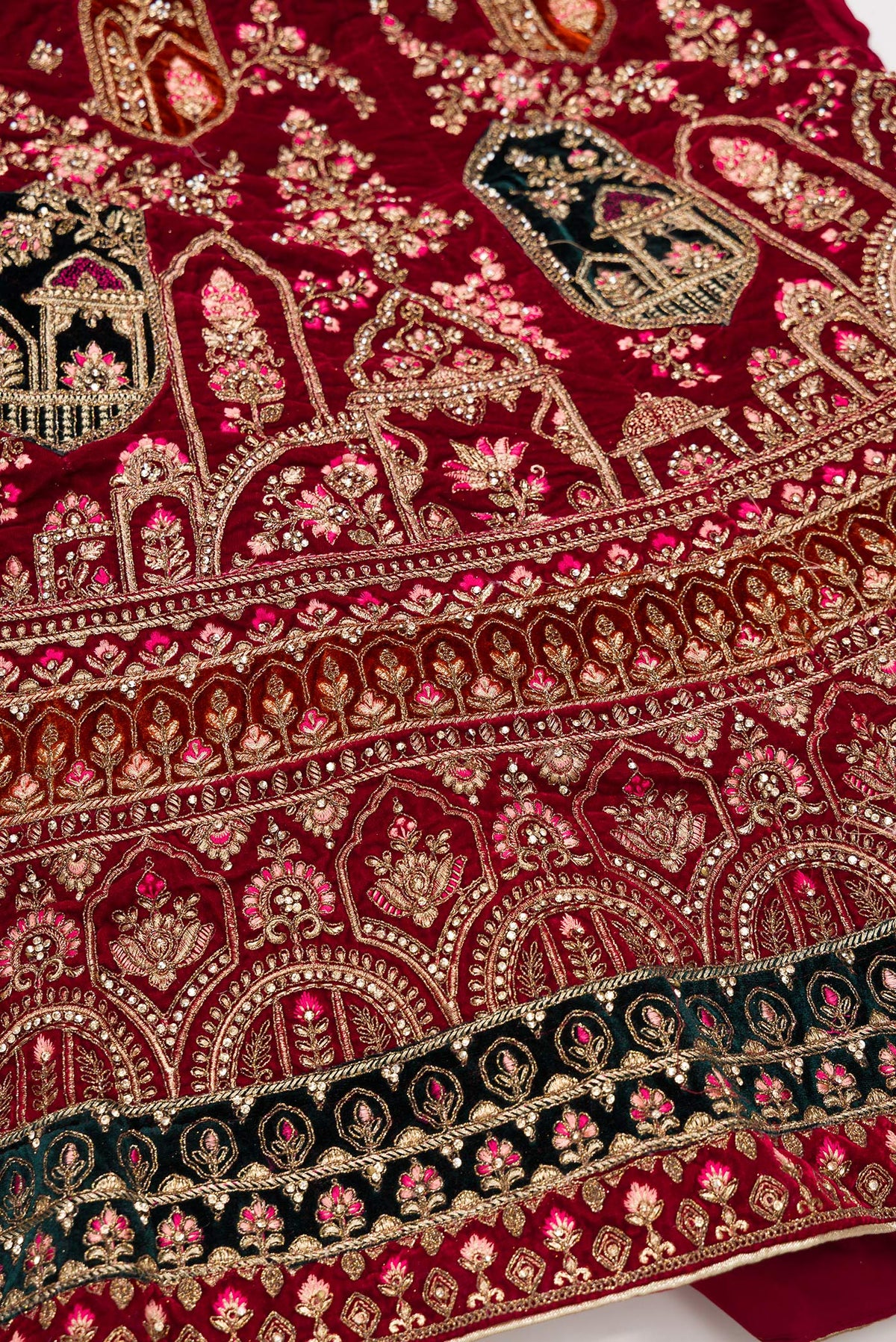 Detailed shot of Dark Pink Banarasi Silk Womens Lehenga set featuring Embroidered Choli paired with Dark Pink Embroidered Skirt with Embroidered Border and a Embroidered dupatta in Dark Pink