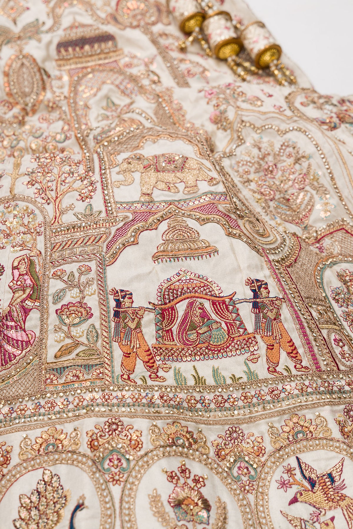 Sandal Net Womens Lehenga set featuring Embroidered Choli paired with Sandal Embroidered Skirt with Embroidered Border and a Embroidered dupatta in Rose pink.