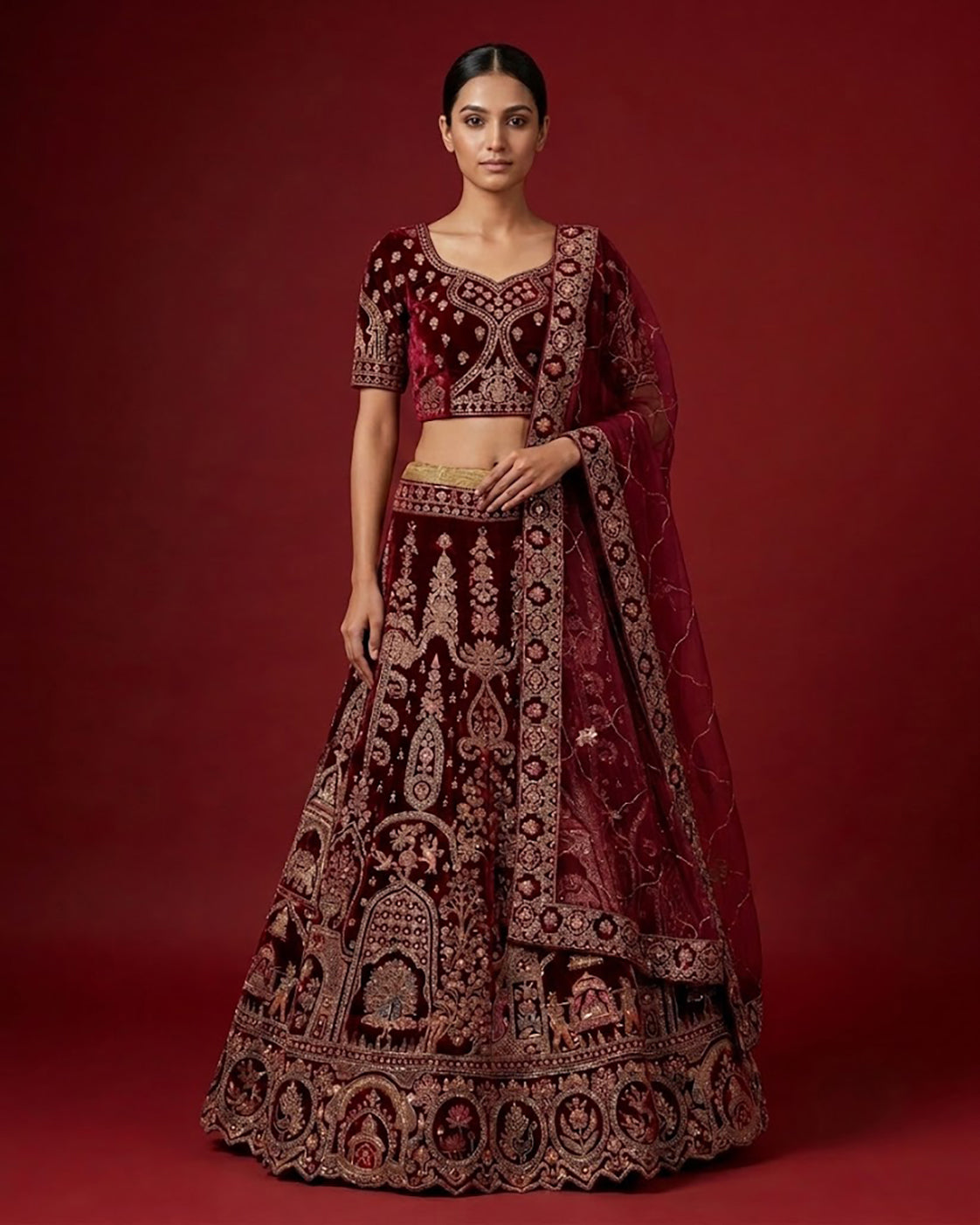Maroon Banarasi Silk Womens Lehenga set featuring Embroidered Choli paired with Maroon Embroidered Skirt with Embroidered Border and a Embroidered dupatta in Maroon
