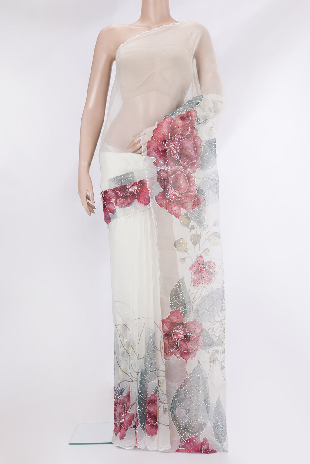 Pure Silk Off White Organza Saree with Embroidery on the body and Sequin Border.  displayed on a mannequin