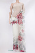 Pure Silk Off White Organza Saree with Embroidery on the body and Sequin Border.  displayed on a mannequin