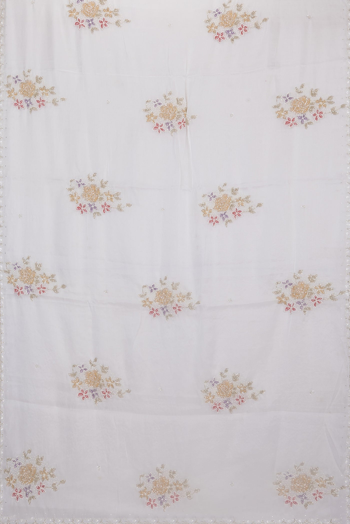 Flat view of Off White Organza Saree with Embroidery on the body and Embroidery Border. 