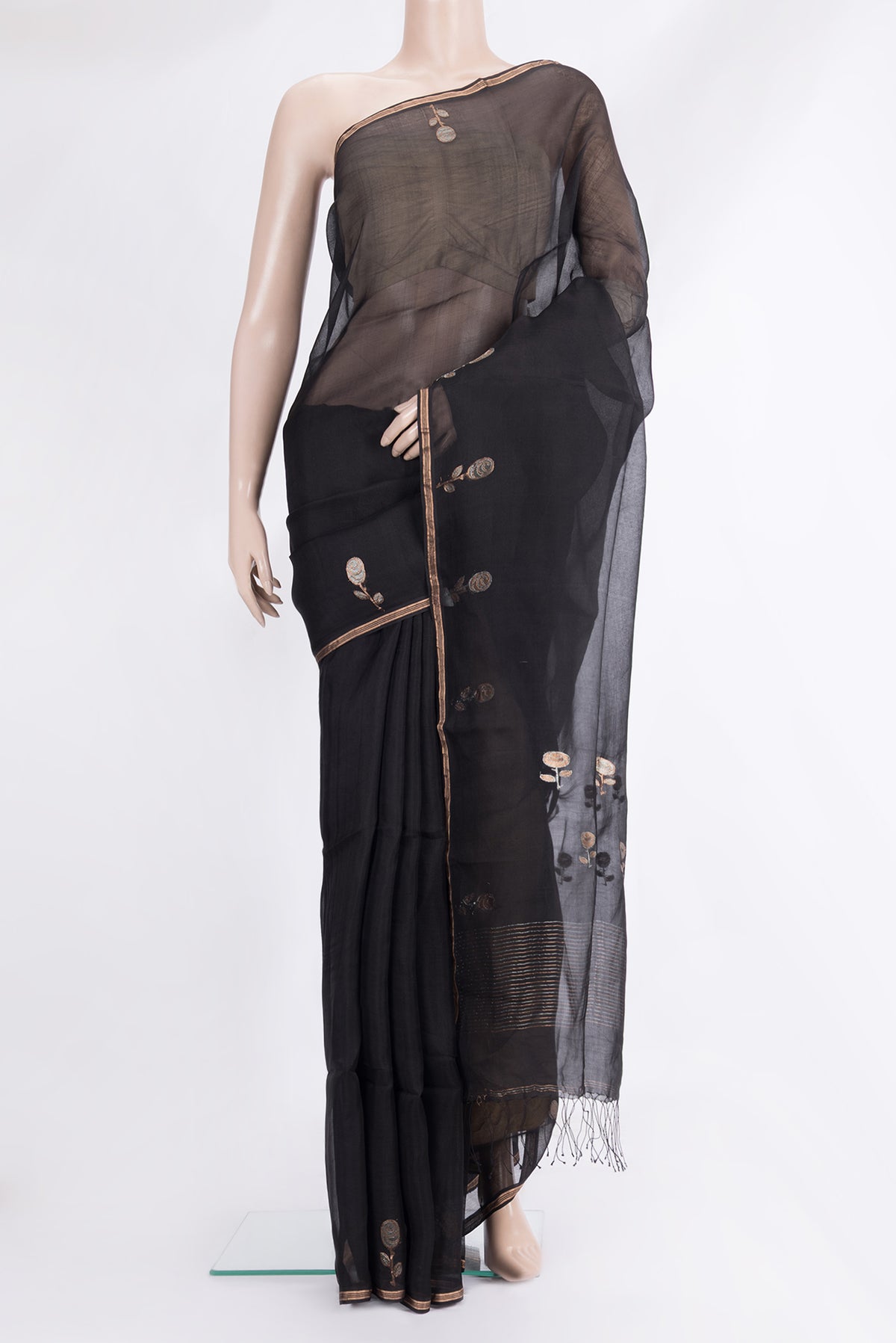 Black Tussar Saree with Plain Body and Zari Border.  displayed on a mannequin