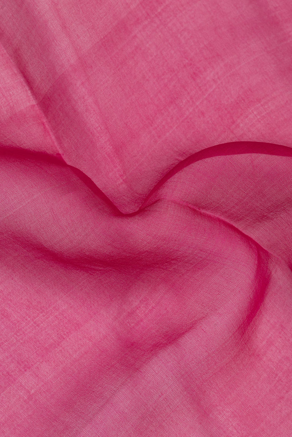 Close up of Pure Silk Dark Pink Dual Tone Tussar Saree with Plain Body and Fancy Border.  displaying folds