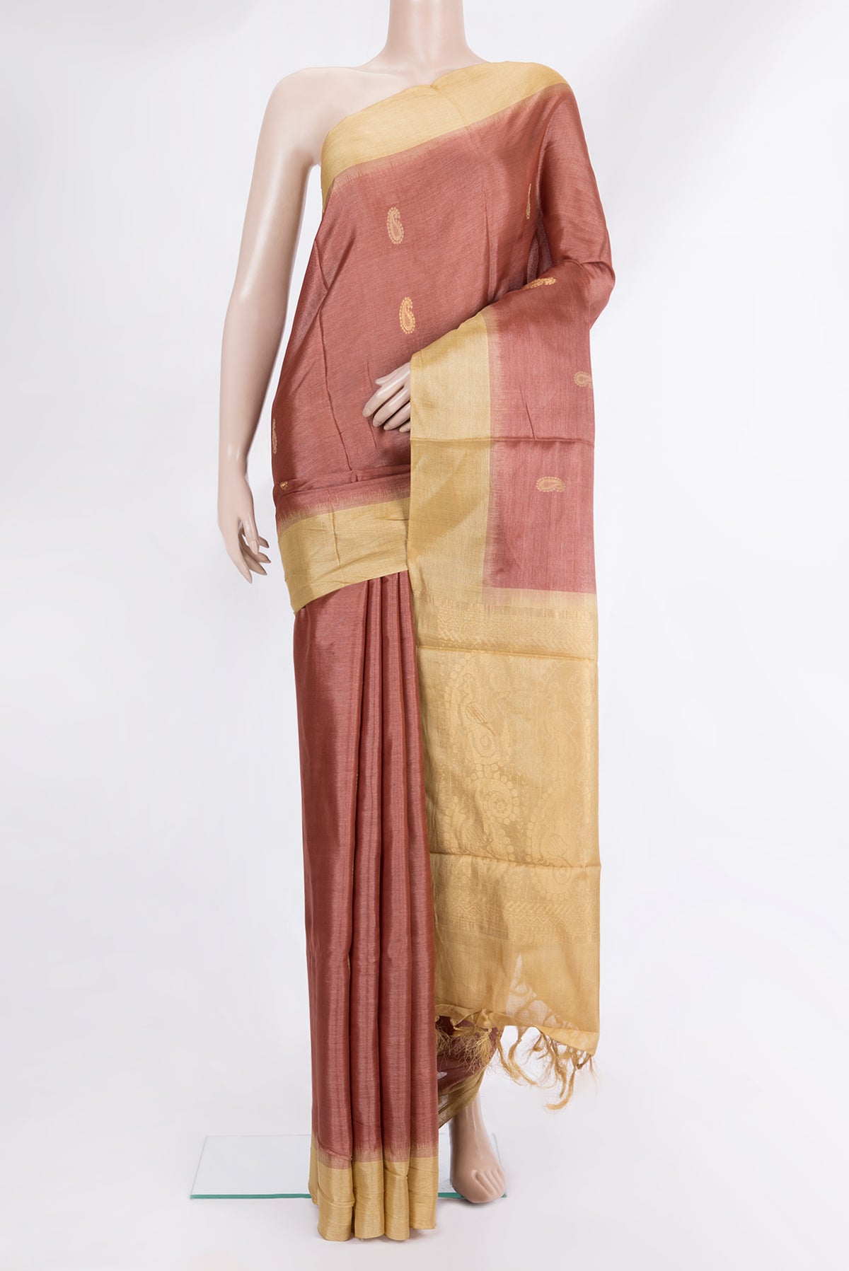 Pure Silk Brown Tussar Saree with Zari And Thread Butta on the body and Plain Border.  displayed on a mannequin