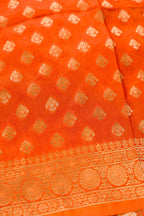 Detailed shot of Orange Banarasi Silk Womens Lehenga set featuring Embroidered Choli paired with Orange Zari Brocade Skirt with Zari Border and a Embroidered dupatta in Orange