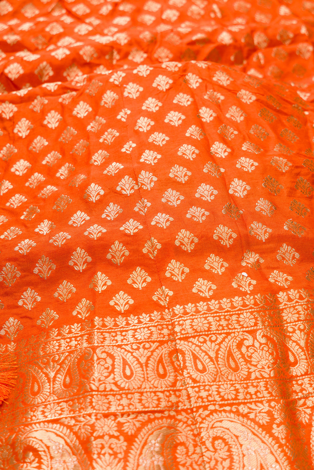 Close up blouse image of Orange Banarasi Silk Womens Lehenga set featuring Embroidered Choli paired with Orange Zari Brocade Skirt with Zari Border and a Embroidered dupatta in Orange