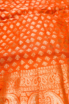 Close up blouse image of Orange Banarasi Silk Womens Lehenga set featuring Embroidered Choli paired with Orange Zari Brocade Skirt with Zari Border and a Embroidered dupatta in Orange