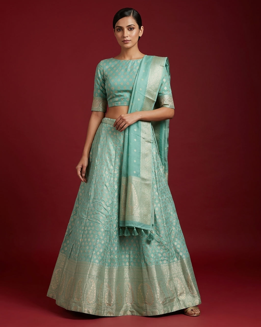 Light Green Banarasi Silk Womens Lehenga set featuring Zari Brocade Choli paired with Light Green Zari Brocade Skirt with Zari Border and a Zari Butta dupatta in Light Green
