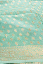 Close up blouse image of Light Green Banarasi Silk Womens Lehenga set featuring Zari Brocade Choli paired with Light Green Zari Brocade Skirt with Zari Border and a Zari Butta dupatta in Light Green