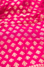 Close up blouse image of Dark Pink Banarasi Silk Womens Lehenga set featuring Zari Brocade Choli paired with Dark Pink Zari Brocade Skirt with Zari Border and a Zari Butta dupatta in Dark Pink