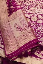 Detailed shot of Magenta Banarasi Silk Womens Lehenga set featuring Zari Brocade Choli paired with Magenta Zari Brocade Skirt with Zari Border and a Zari Butta dupatta in Magenta