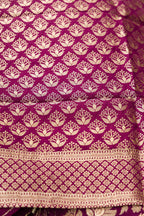 Close up blouse image of Magenta Banarasi Silk Womens Lehenga set featuring Zari Brocade Choli paired with Magenta Zari Brocade Skirt with Zari Border and a Zari Butta dupatta in Magenta