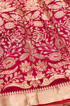 Detailed shot of Imperial Red Banarasi Silk Womens Lehenga set featuring Zari Brocade Choli paired with Imperial Red Zari Brocade Skirt with Zari Border and a Zari Butta dupatta in Imperial Red